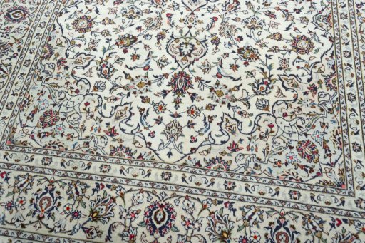 Close-up detail of 2000s Kashan rug from Iran / Persia showing Wool weave