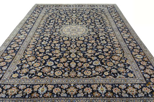 Surface texture of 2000s Kashan rug with natural Wool and intricate pattern