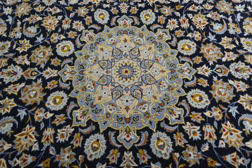 Central medallion detail of 2000s Kashan rug from Iran / Persia