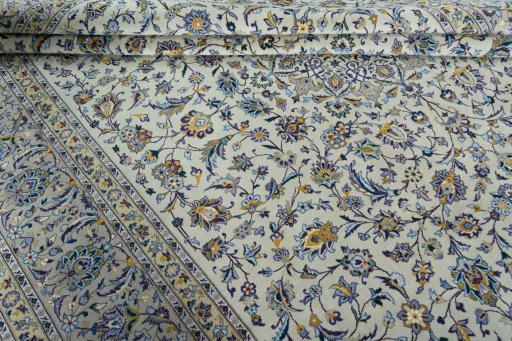 Close-up detail of 2000s Kashan rug from Iran / Persia showing Wool weave