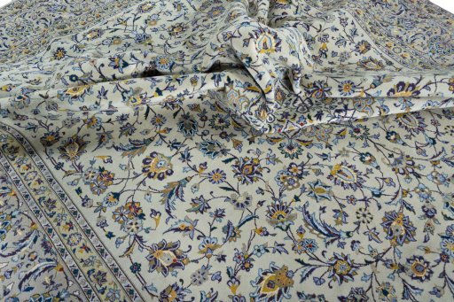 Surface texture of 2000s Kashan rug with natural Wool and intricate pattern