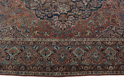 Corner detail of 1930s Kashan rug showing border pattern and Wool pile