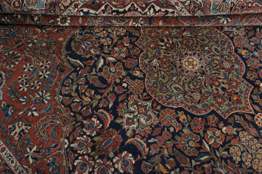 Close-up detail of 1930s Kashan rug from Iran / Persia showing Wool weave