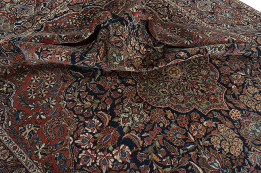Surface texture of 1930s Kashan rug with natural Wool and intricate pattern