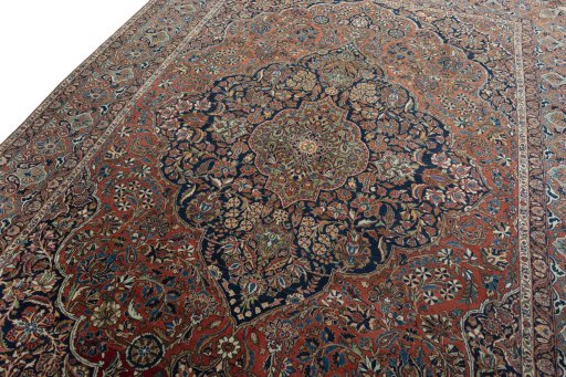 Backside of handmade 1930s Kashan rug showing knot structure and weave density