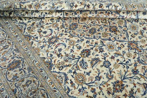 Close-up detail of 2000s Kashan rug from Iran / Persia showing Wool weave