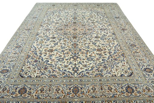 Surface texture of 2000s Kashan rug with natural Wool and intricate pattern
