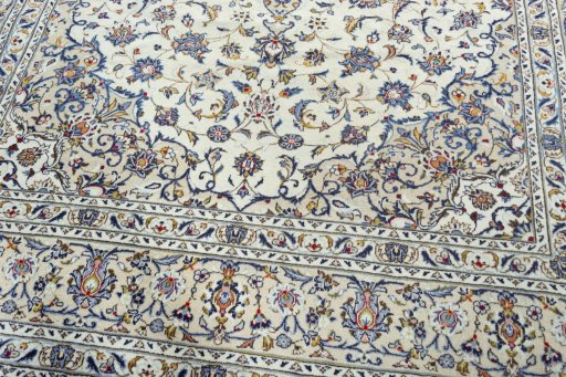 Close-up detail of 2000s Kashan rug from Iran / Persia showing Wool weave
