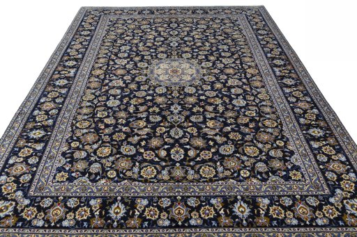 Surface texture of 2000s Kashan rug with natural Wool and intricate pattern
