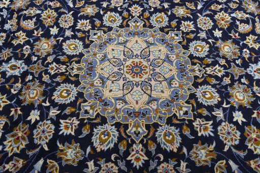 Central medallion detail of 2000s Kashan rug from Iran / Persia