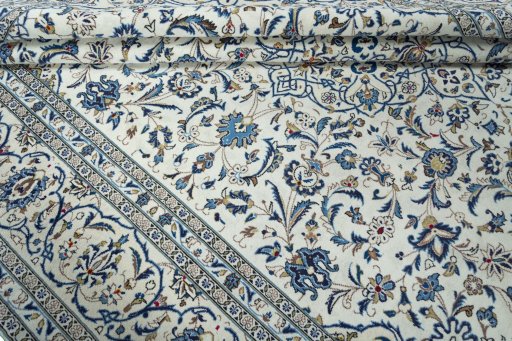 Close-up detail of 2000s Kashan rug from Iran / Persia showing Wool weave