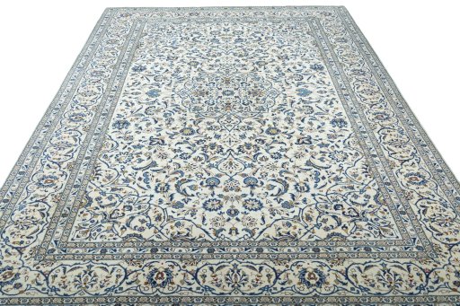 Surface texture of 2000s Kashan rug with natural Wool and intricate pattern