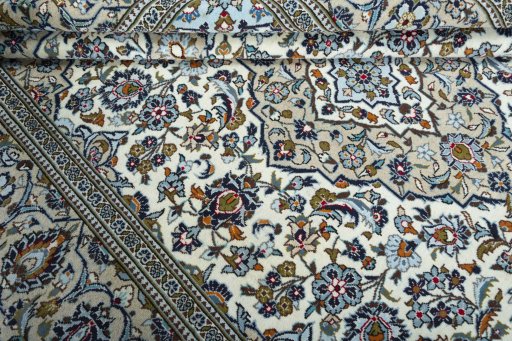 Close-up detail of 2000s Kashan rug from Iran / Persia showing Wool weave