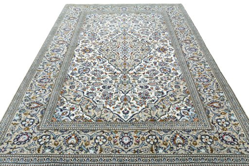 Surface texture of 2000s Kashan rug with natural Wool and intricate pattern