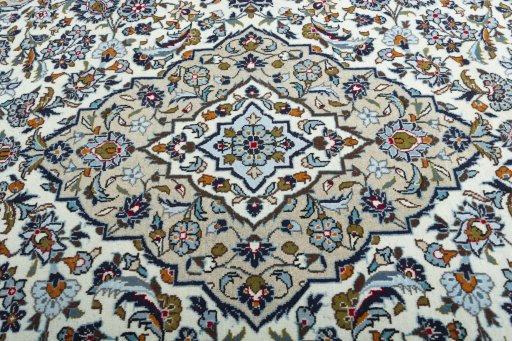 Central medallion detail of 2000s Kashan rug from Iran / Persia