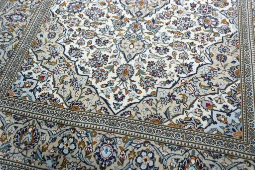 Close-up detail of 2000s Kashan rug from Iran / Persia showing Wool weave