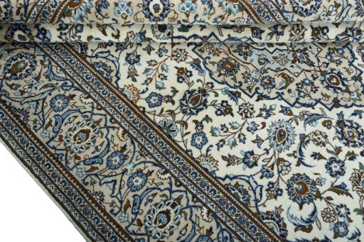 Close-up detail of 2000s Kashan rug from Iran / Persia showing Wool weave