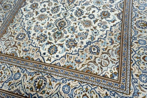Close-up detail of 2000s Kashan rug from Iran / Persia showing Wool weave
