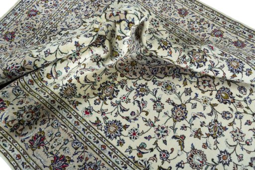 Surface texture of 2000s Kashan rug with natural Wool and intricate pattern