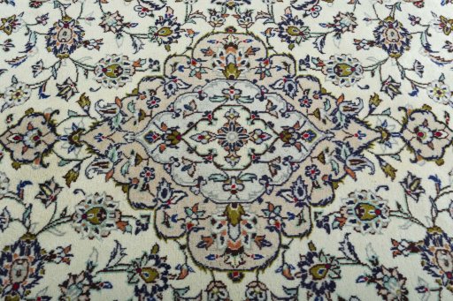 Central medallion detail of 2000s Kashan rug from Iran / Persia