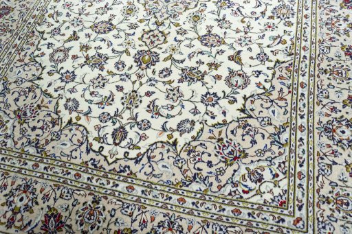 Close-up detail of 2000s Kashan rug from Iran / Persia showing Wool weave