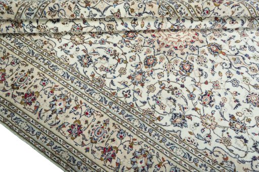 Close-up detail of 2000s Kashan rug from Iran / Persia showing Wool weave