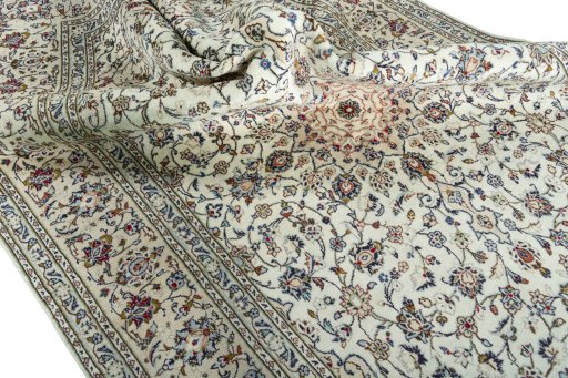 Surface texture of 2000s Kashan rug with natural Wool and intricate pattern