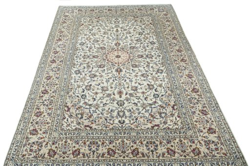 Surface texture of 2000s Kashan rug with natural Wool and intricate pattern