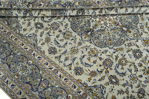 Close-up detail of 2000s Kashan rug from Iran / Persia showing Wool weave
