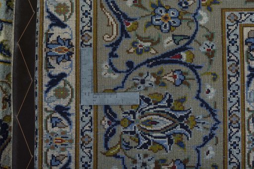 Backside of handmade 2000s Kashan rug showing knot structure and weave density