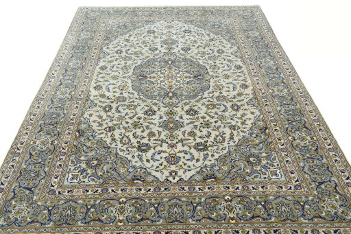 Surface texture of 2000s Kashan rug with natural Wool and intricate pattern