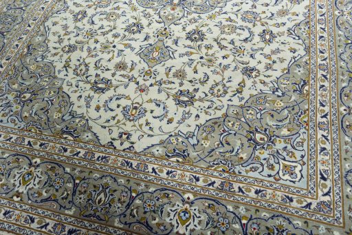 Close-up detail of 2000s Kashan rug from Iran / Persia showing Wool weave