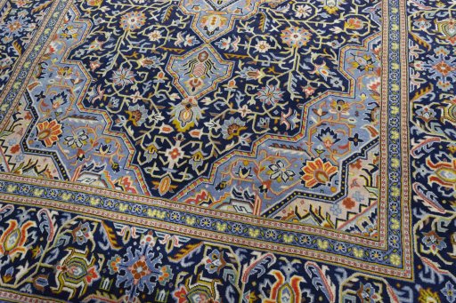 Close-up detail of 2000s Kashan rug from Iran / Persia showing Wool weave