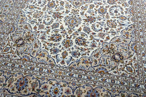 Close-up detail of 2000s Kashan rug from Iran / Persia showing Wool weave