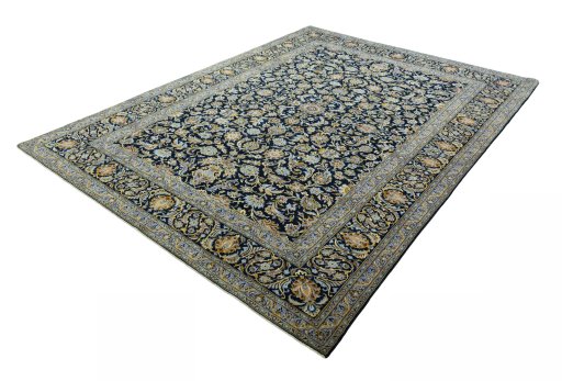 Corner detail of 2000s Kashan rug showing border pattern and Wool pile