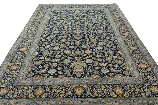 Surface texture of 2000s Kashan rug with natural Wool and intricate pattern