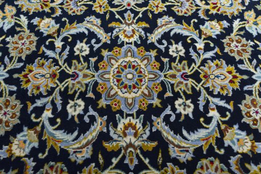 Central medallion detail of 2000s Kashan rug from Iran / Persia