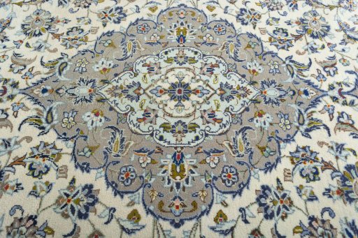Central medallion detail of 2000s Kashan rug from Iran / Persia