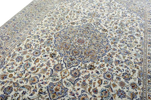 Backside of handmade 2000s Kashan rug showing knot structure and weave density