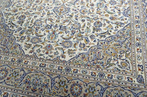 Close-up detail of 2000s Kashan rug from Iran / Persia showing Wool weave