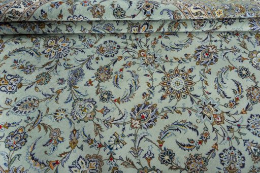Close-up detail of 1970s Kashan rug from Iran / Persia showing Wool weave