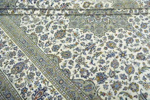 Close-up detail of 2000s Kashan rug from Iran / Persia showing Wool weave