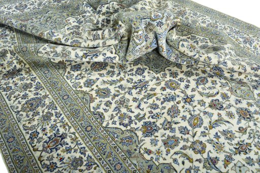 Surface texture of 2000s Kashan rug with natural Wool and intricate pattern