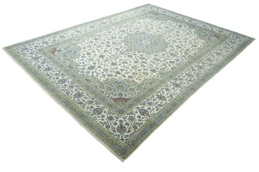 Corner detail of 2000s Kashan rug showing border pattern and Wool pile