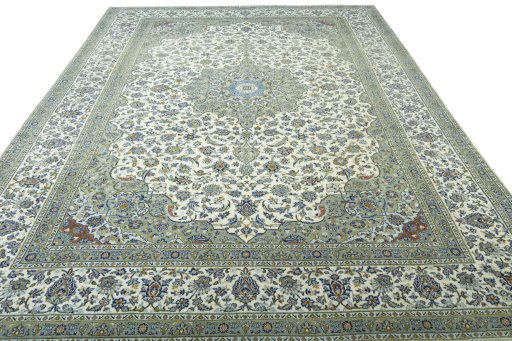 Surface texture of 2000s Kashan rug with natural Wool and intricate pattern