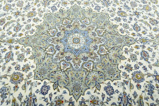 Central medallion detail of 2000s Kashan rug from Iran / Persia