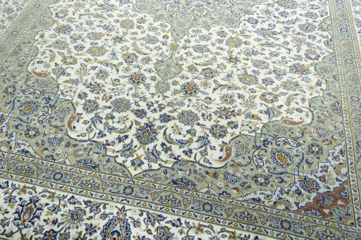 Close-up detail of 2000s Kashan rug from Iran / Persia showing Wool weave
