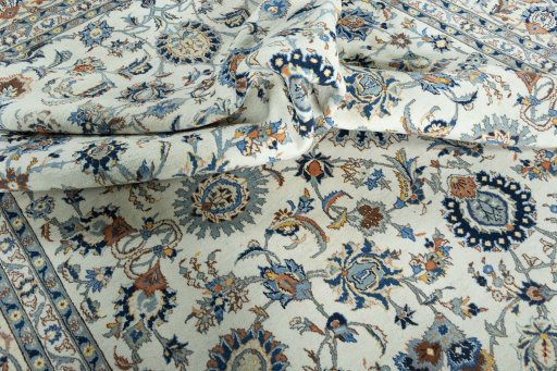 Surface texture of 2000s Kashan rug with natural Wool and intricate pattern