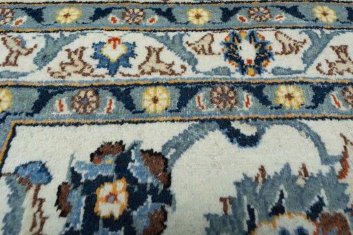 Central medallion detail of 2000s Kashan rug from Iran / Persia