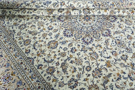 Close-up detail of 2000s Kashan rug from Iran / Persia showing Wool weave